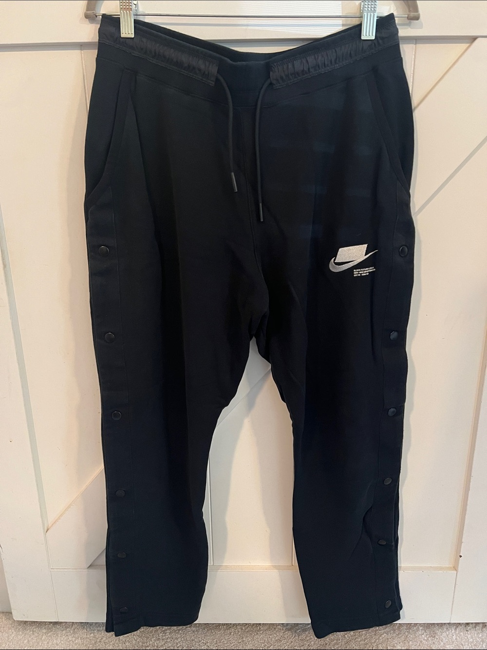 Nike Black Snap-Leg Sweatpants Pants with White Swoosh